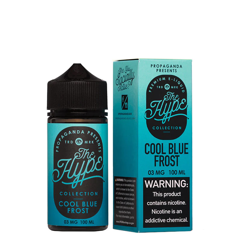 A 100ml bottle of Cool Blue Frost Propaganda The Hype eLiquid and a box with a warning sign next to it - Vaper Corner