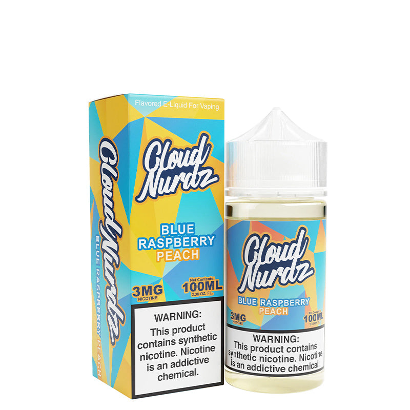 A box of Peach Blue Raspberry TFN Cloud Nurdz with a warning sign and a 100ml bottle next to it - Vaper Corner